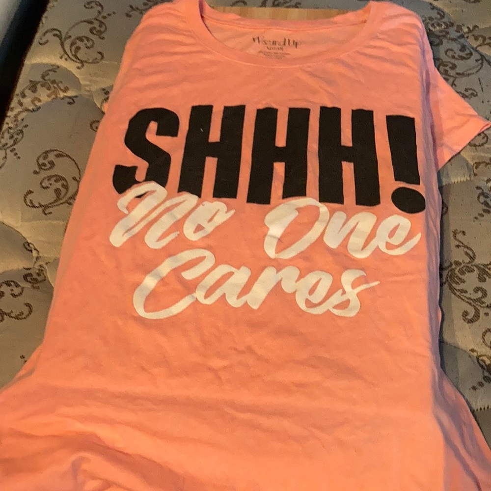 T-shirt Its a large (11-13) the brand is Wound up
